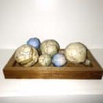 Learn how to make the cutest decor balls. These Map Decor Balls are so fun. They add the perfect touch of color to your Farmhouse home. You will love this easy and affordable centerpiece. #decorballs #mapdecorballs #vintagedecor #diydecorationballs