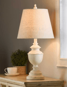 Round distressed white lamp with white lamp shade