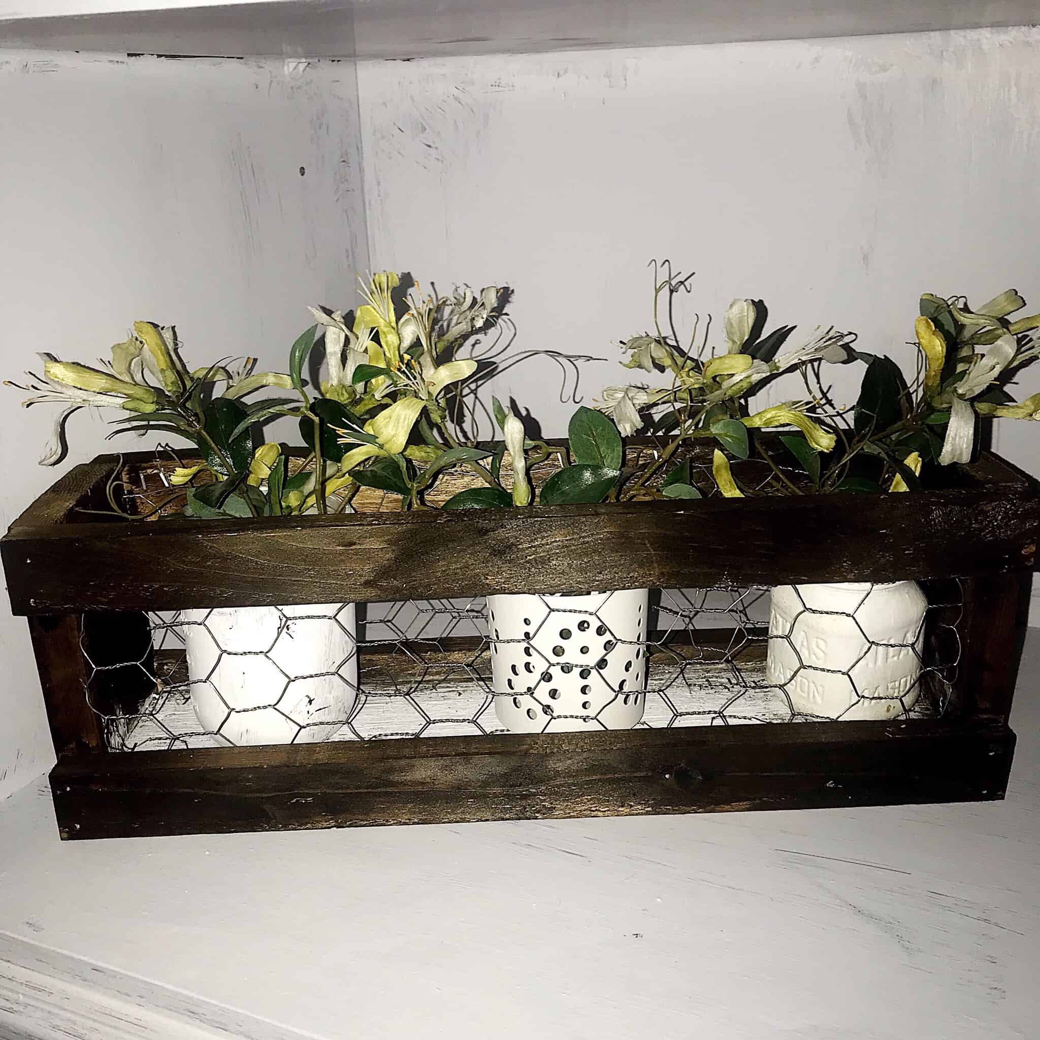 Close up of diy chicken wire wood planter